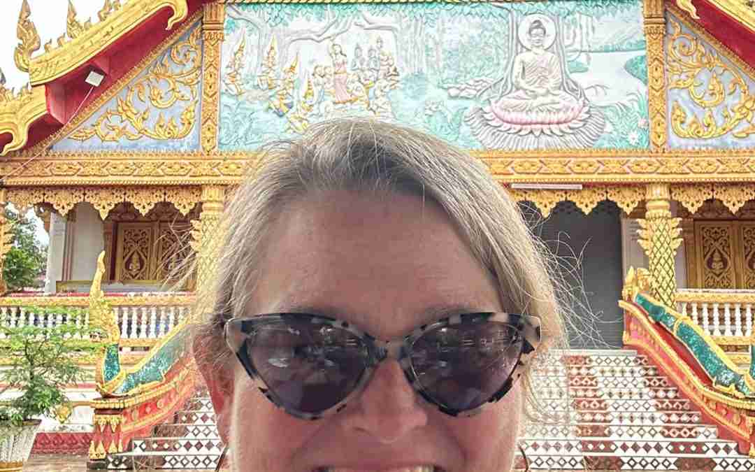 Betsy Kimmel smiling outdoors, representing the gap between what we show on social media and what we carry underneath.